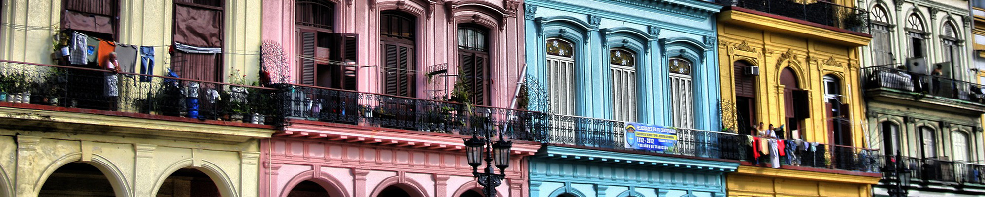 balconies of colorful buildings in cuba
